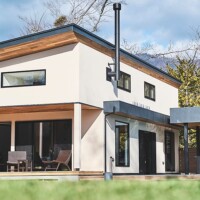 A one -story villa with a chimney