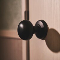 Each room is unified with iron doorknob