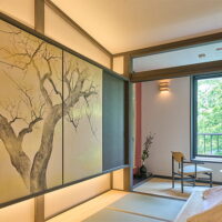 When you open the plum-patterned sliding doors…