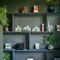 Vintage books on the stairway shelves